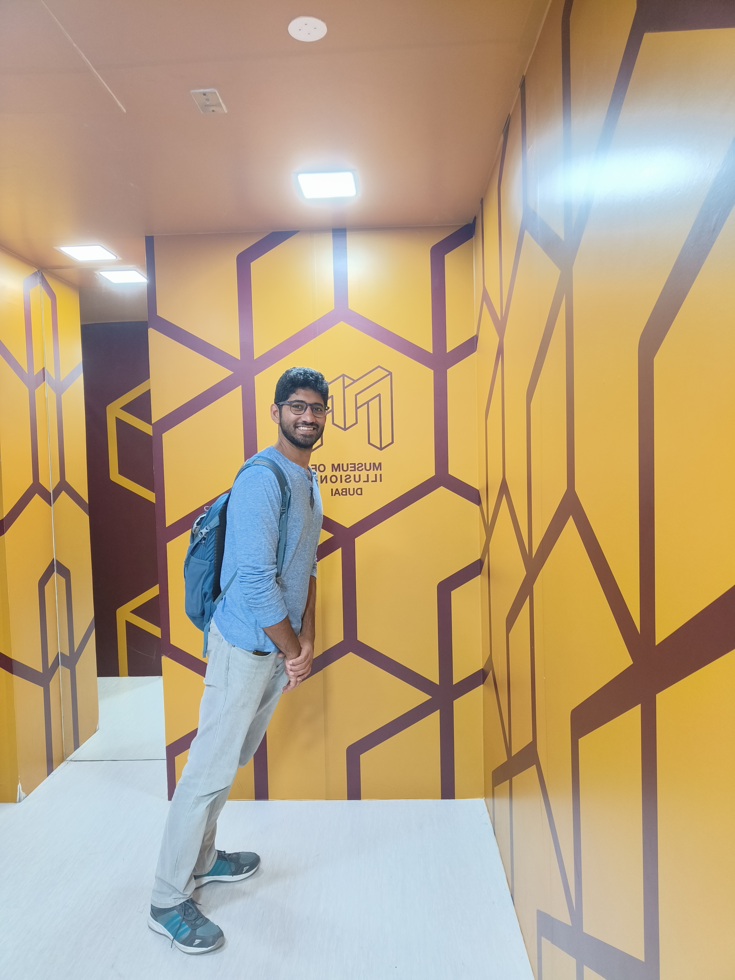 Museum of Illusions gravity-defying room - tilted space creating visual perception of walking on walls